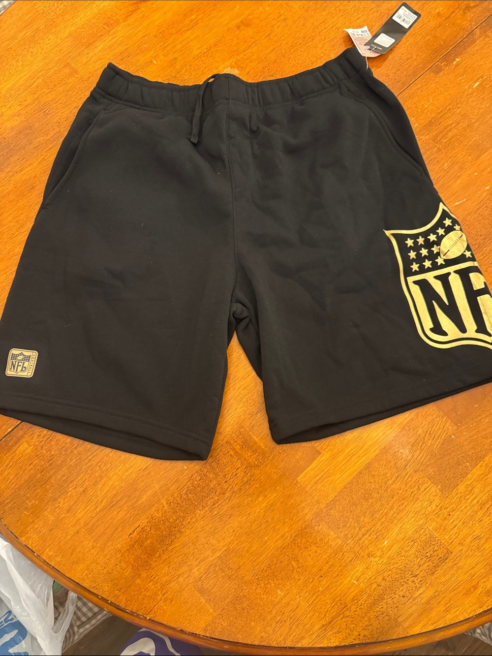 NFL Black Athletic Shorts with Gold Shield Accent xl